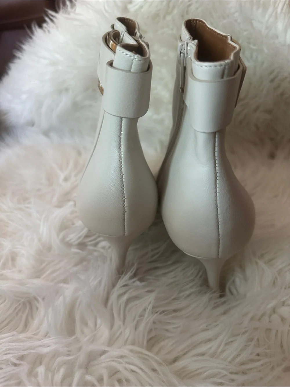Calvin Klein Cream Leather Pointed-Toe Ankle Booties with Gold Buckle