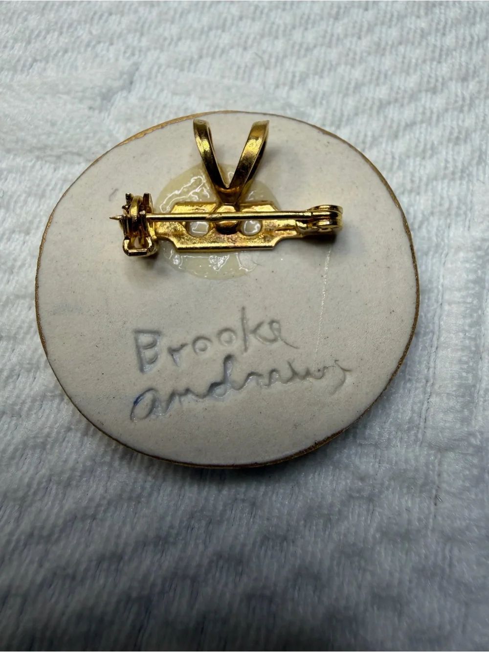 Blue and Cream Wind Face Ceramic Pin with Gold Trim