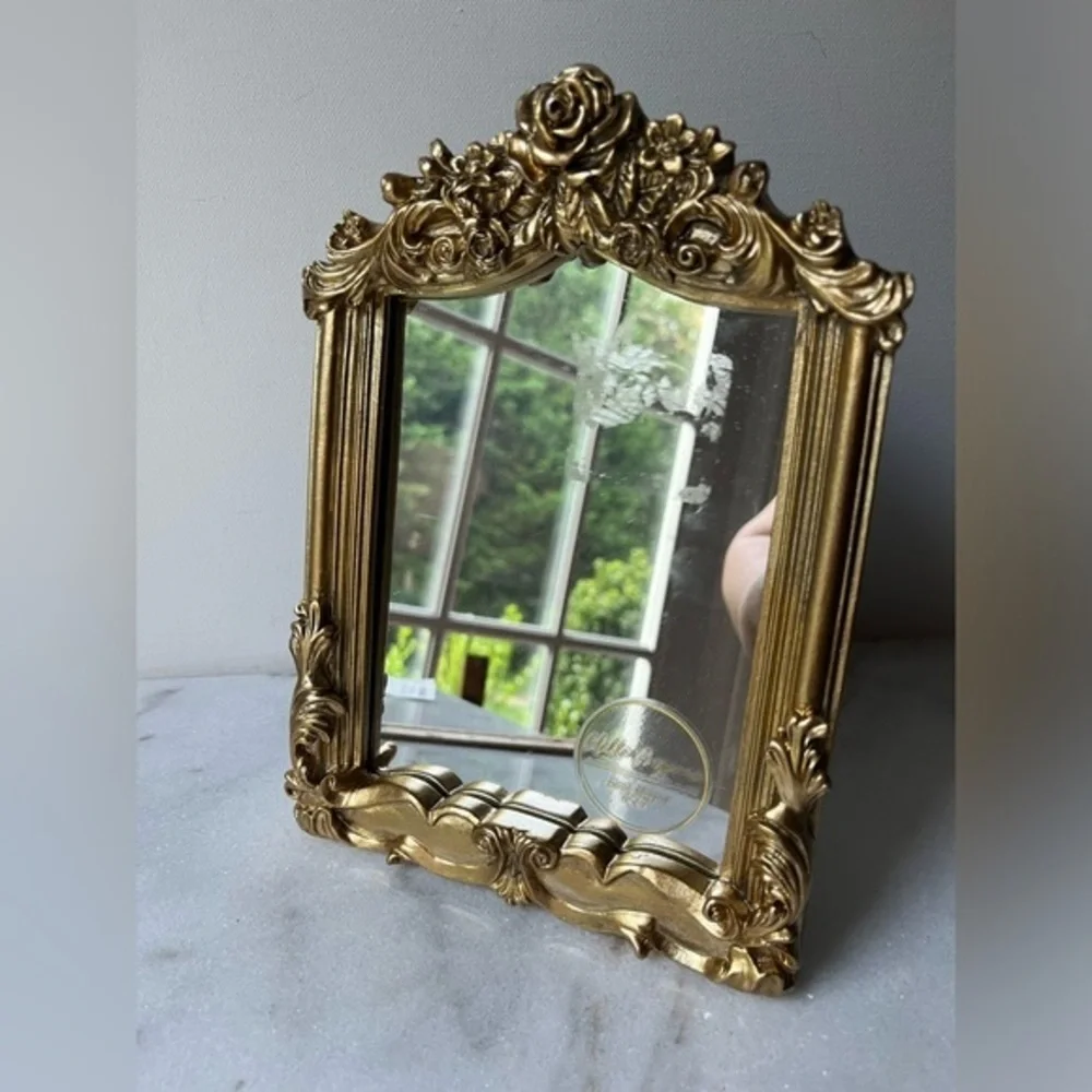 Nicole Miller vanity gold
