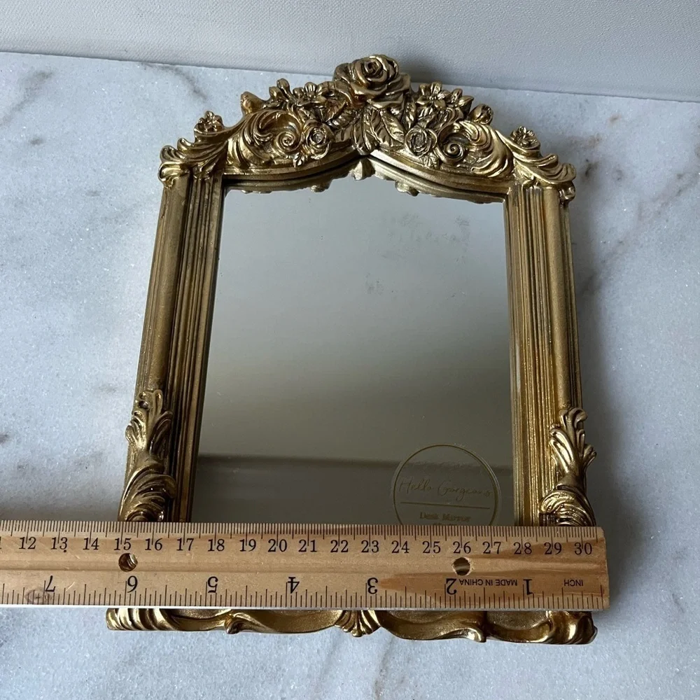 Nicole Miller frame gold ornate