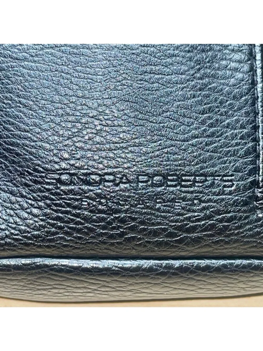 Sondra Roberts compartments photos worn