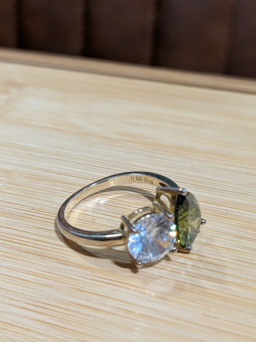 Double Stone Ring with Green Teardrop and Clear Round Gem