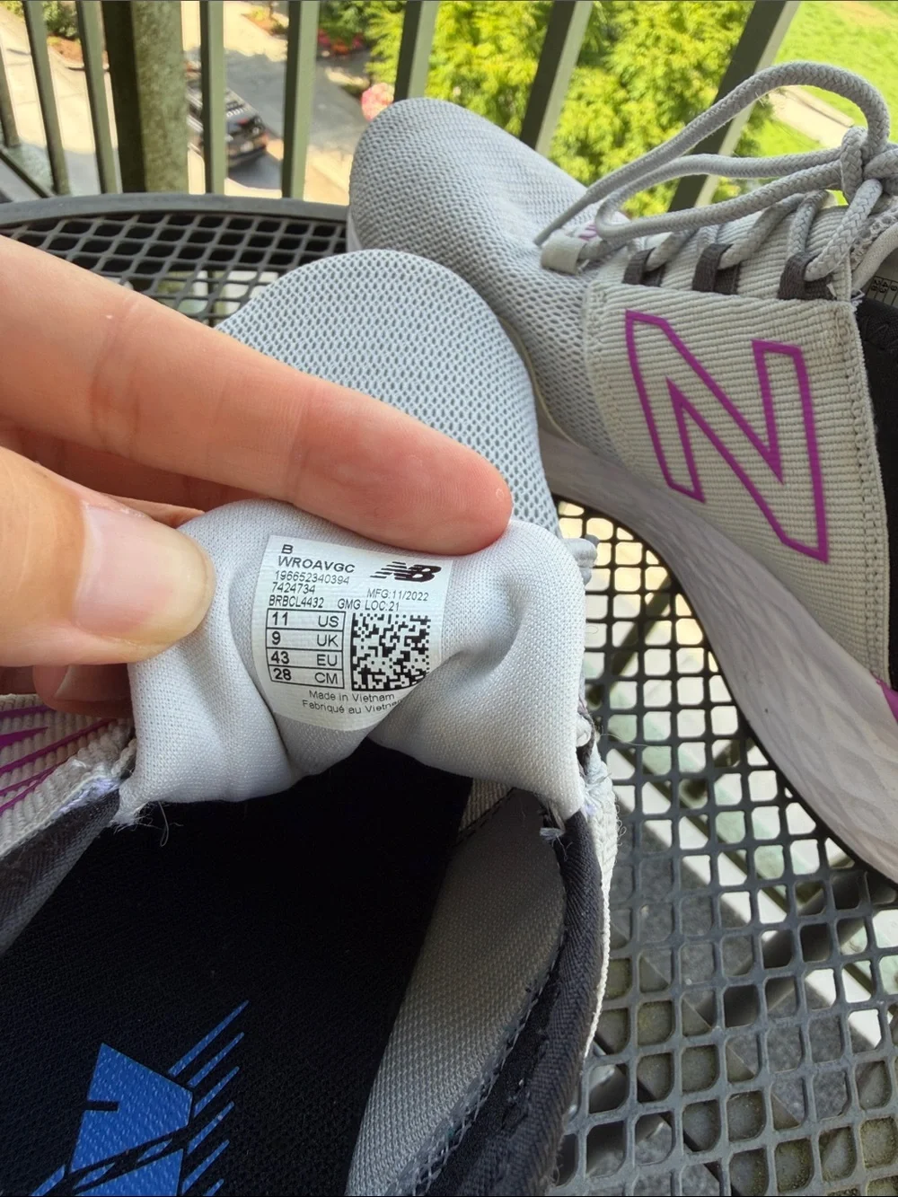 New Balance Women’s Fresh Foam Roav Light Gray Mesh Sneakers with pink trim