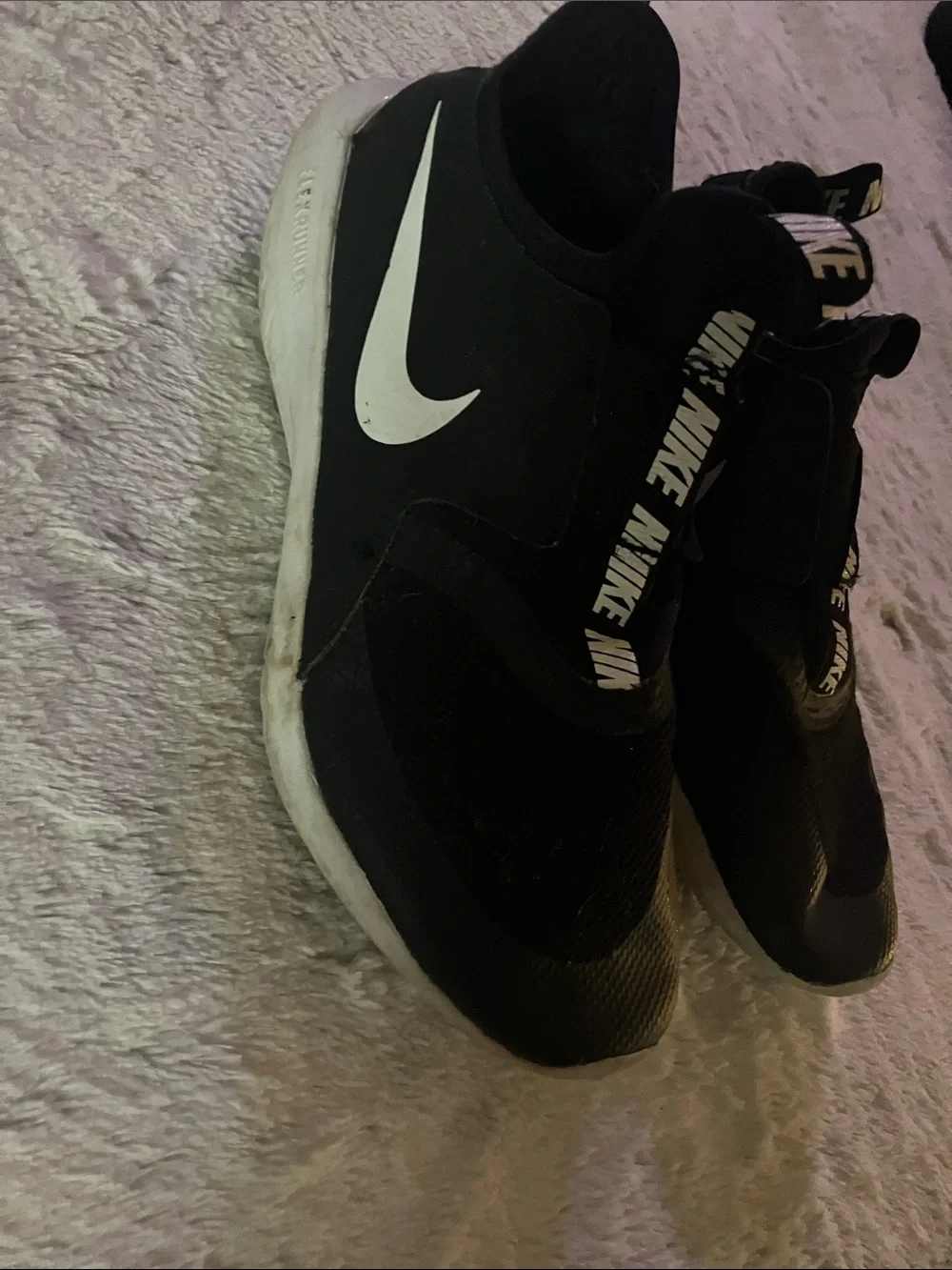 Nike Black Slip-On Athletic Shoes with White Swoosh Accent