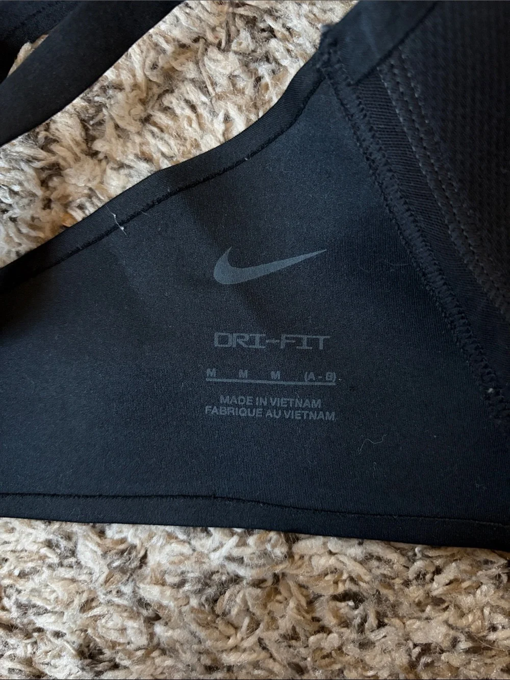 Nike design perforations bust