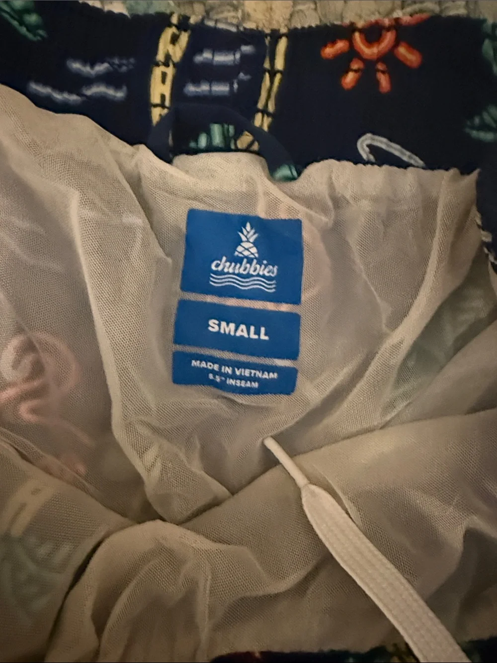 chubbies Navy Swim Shorts with Tropical Accents