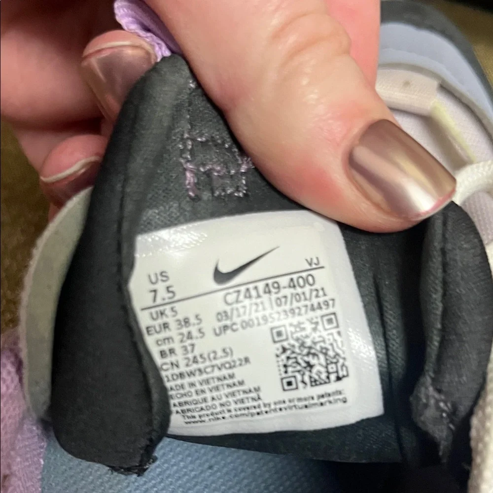 Nike Sneakers in Purple, White, and Black