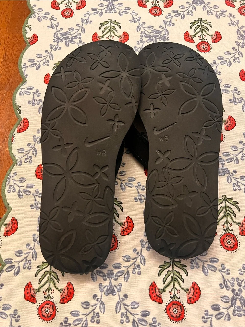 Woman’s Nike Black Flip Flop Sandals with White Swoosh