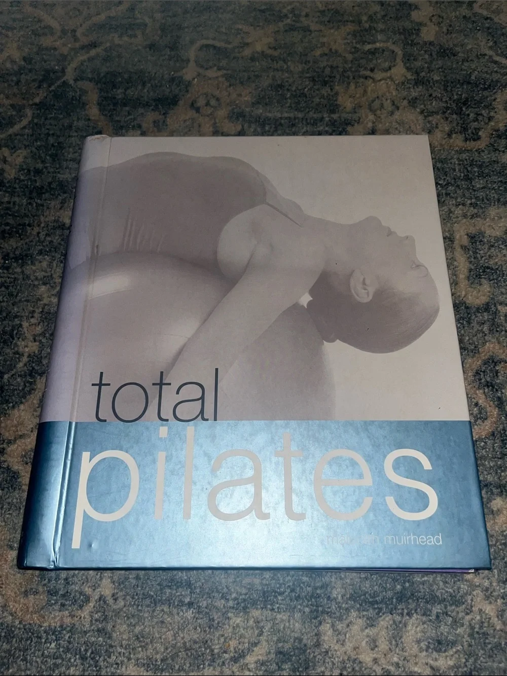 Total Pilates Book in Blue and White by Malcolm Muirhead