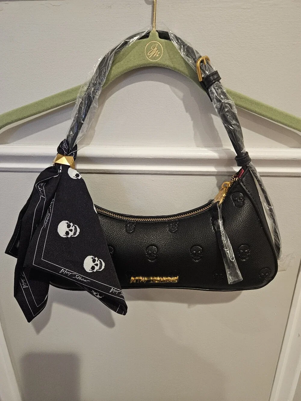 Betsey Johnson Black Leather Shoulder Bag with Skull Emboss and Scarf Accent