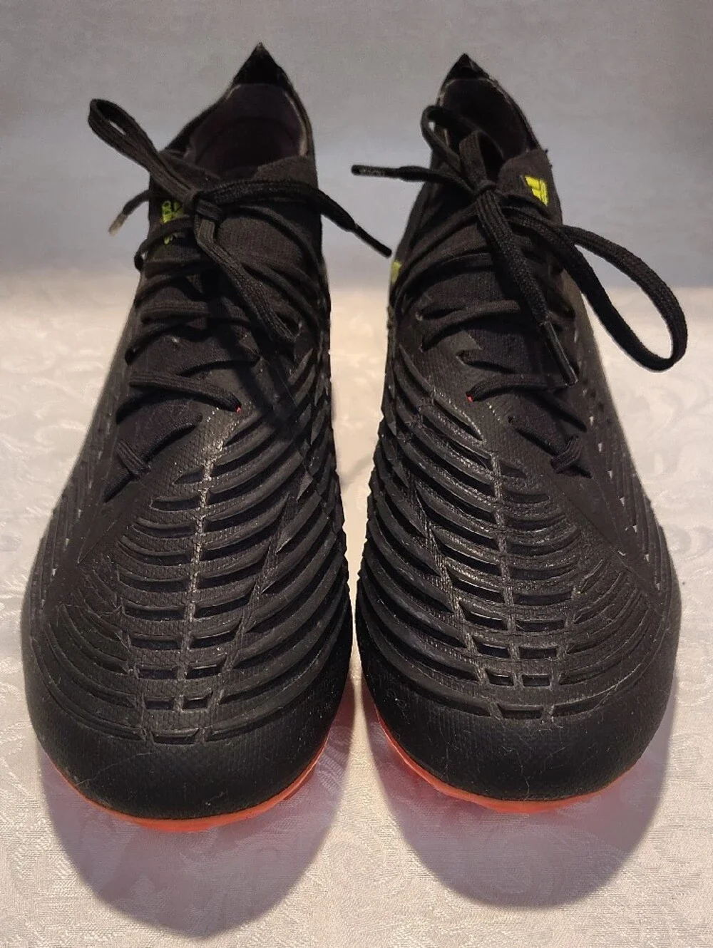 Adidas Men’s Black Soccer Cleats with Neon Yellow Stripes