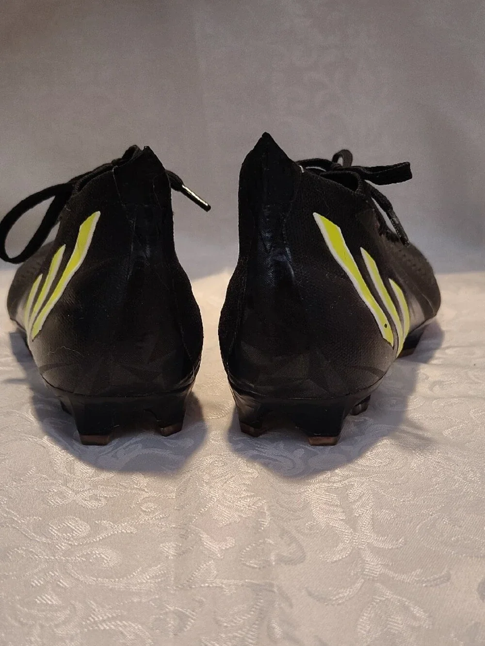 Adidas Men’s Black Soccer Cleats with Neon Yellow Stripes