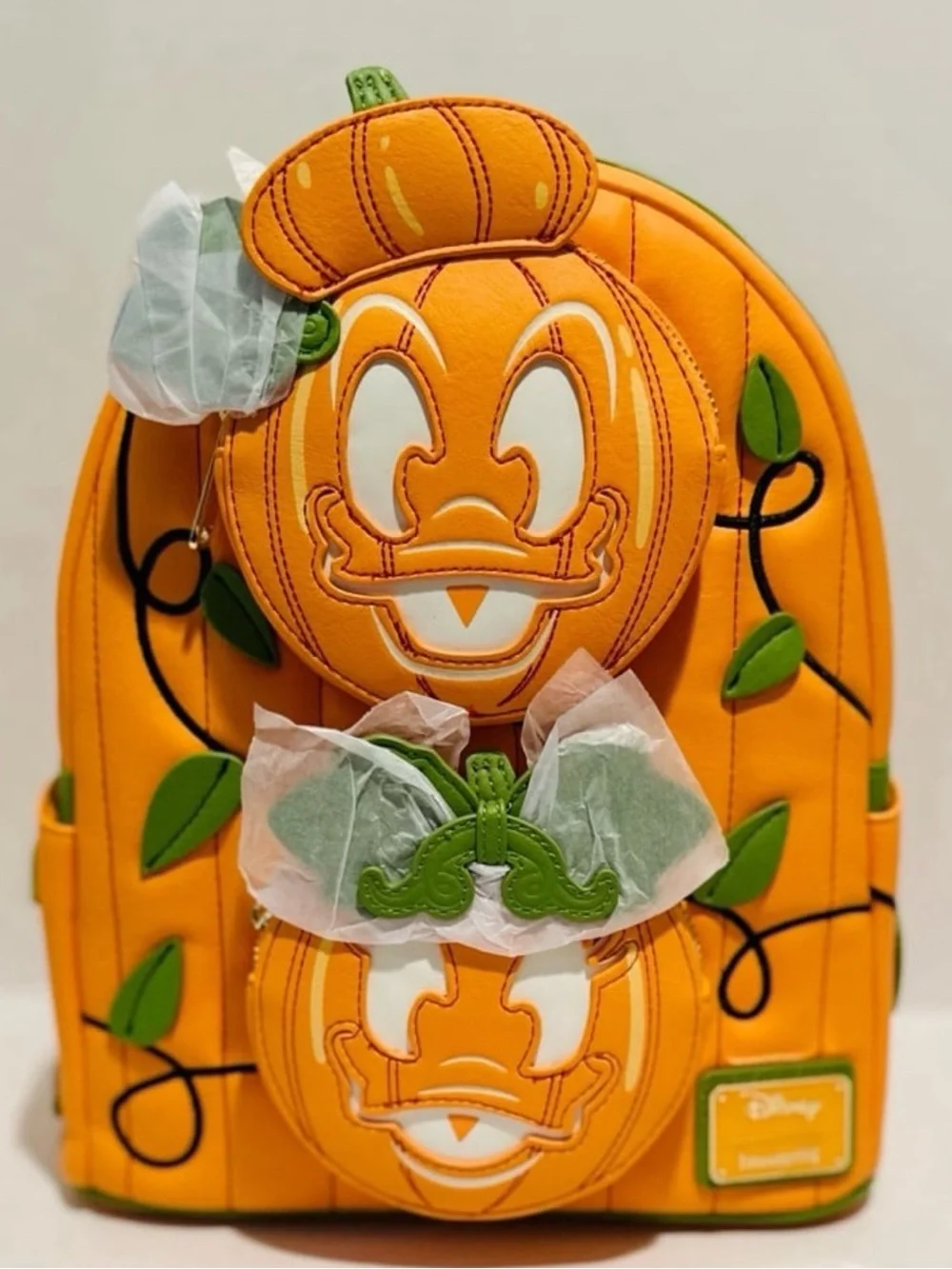 Loungefly Disney NWT Donald & Daisy Jack-o’-Lantern Glow Mini Backpack
