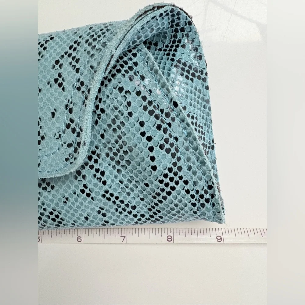 Turquoise python or snakeskin patterned leather clutch bag a twist-lock closure