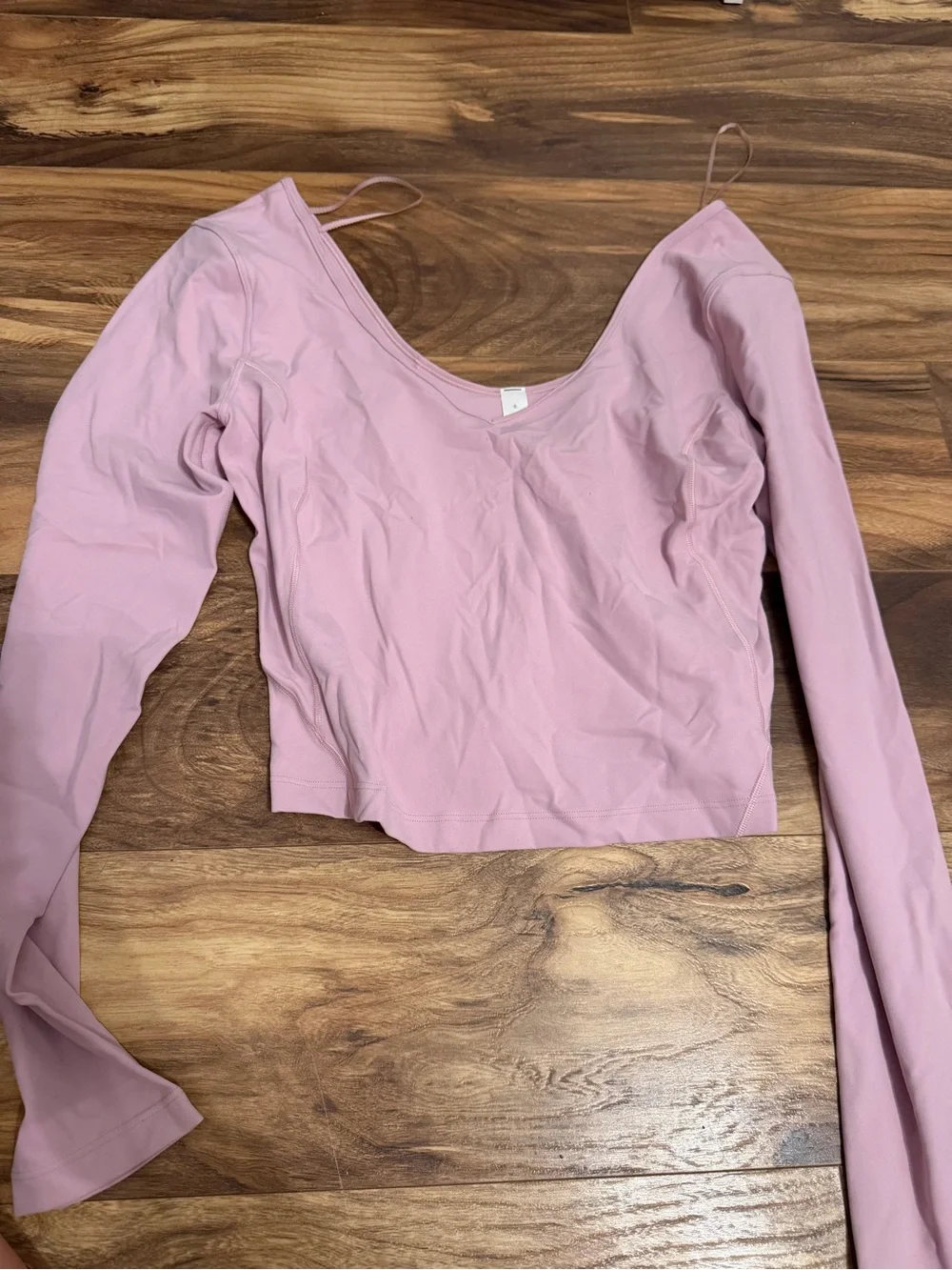 NEVER WORN PINK TANK TOP LULULEMON SIZE 6 but fits like a 4