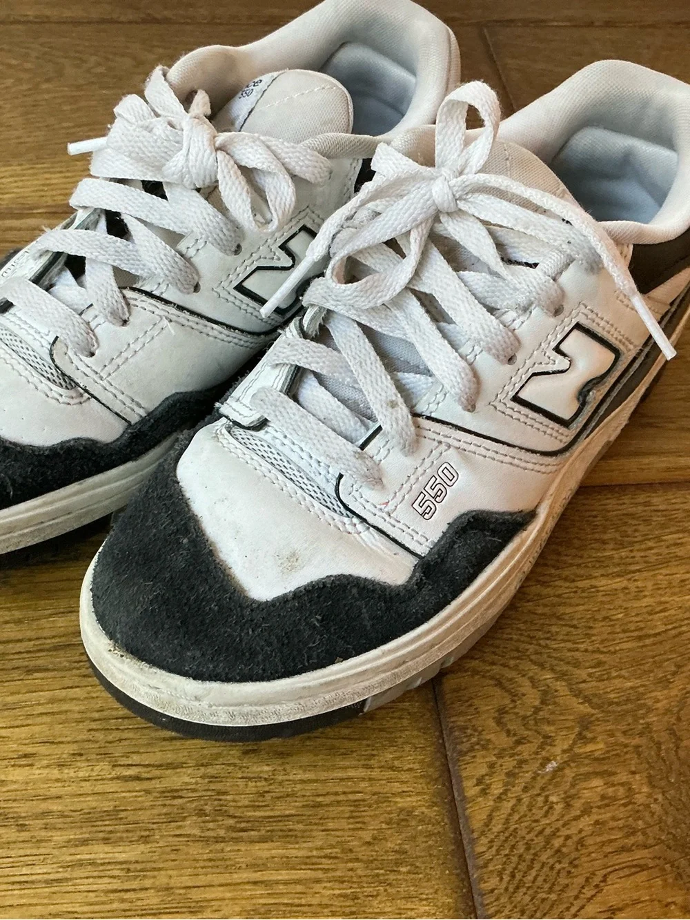 New Balance 550 White and Black Retro Sneakers