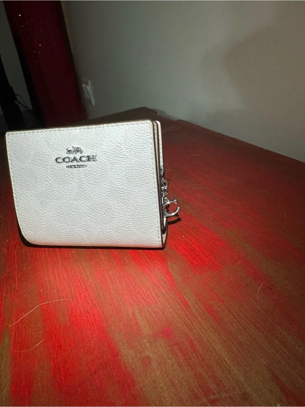 Coach compact bi
