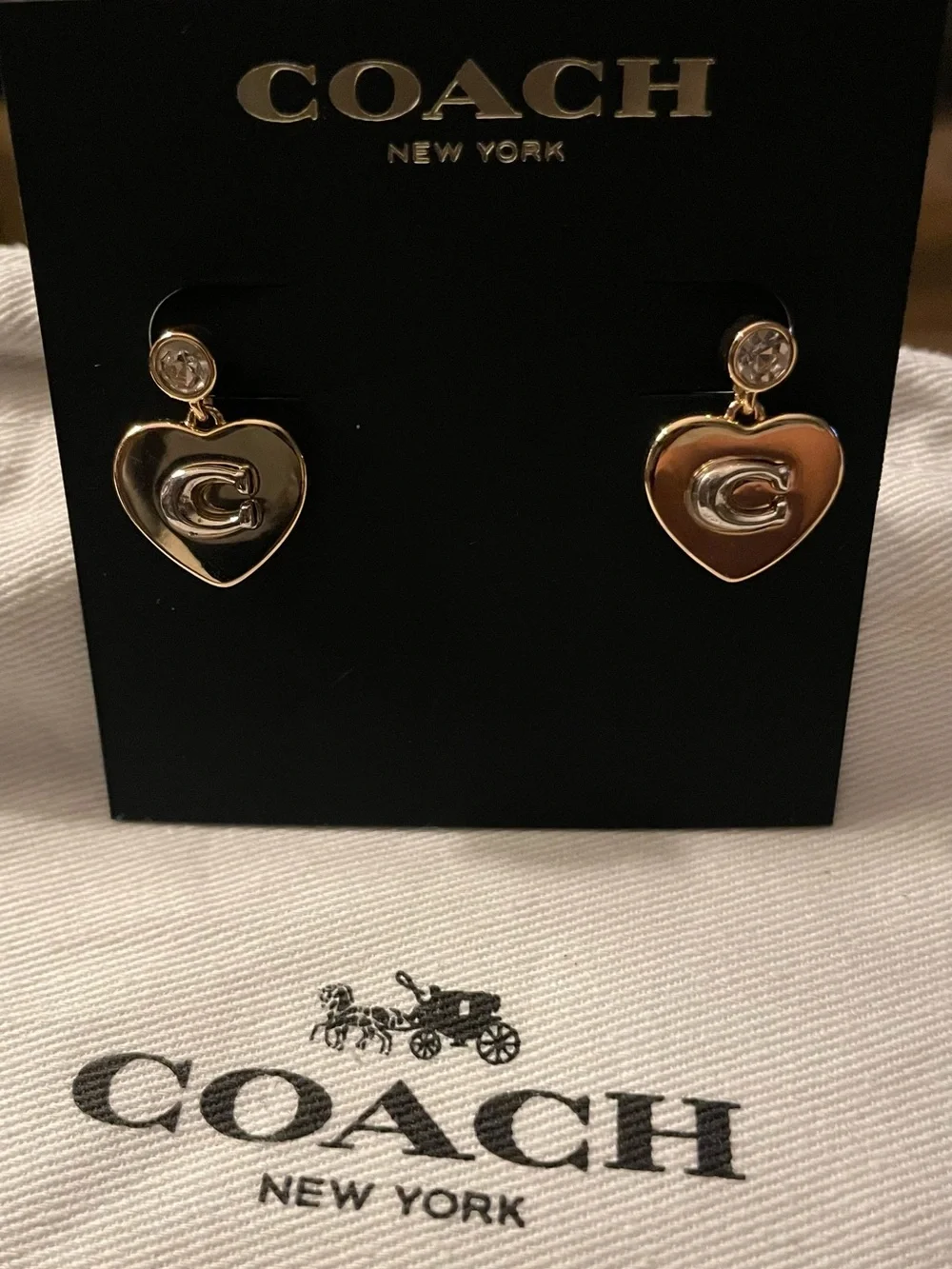 Coach gold tone