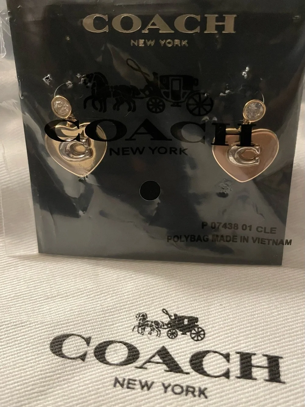 Coach gold tone