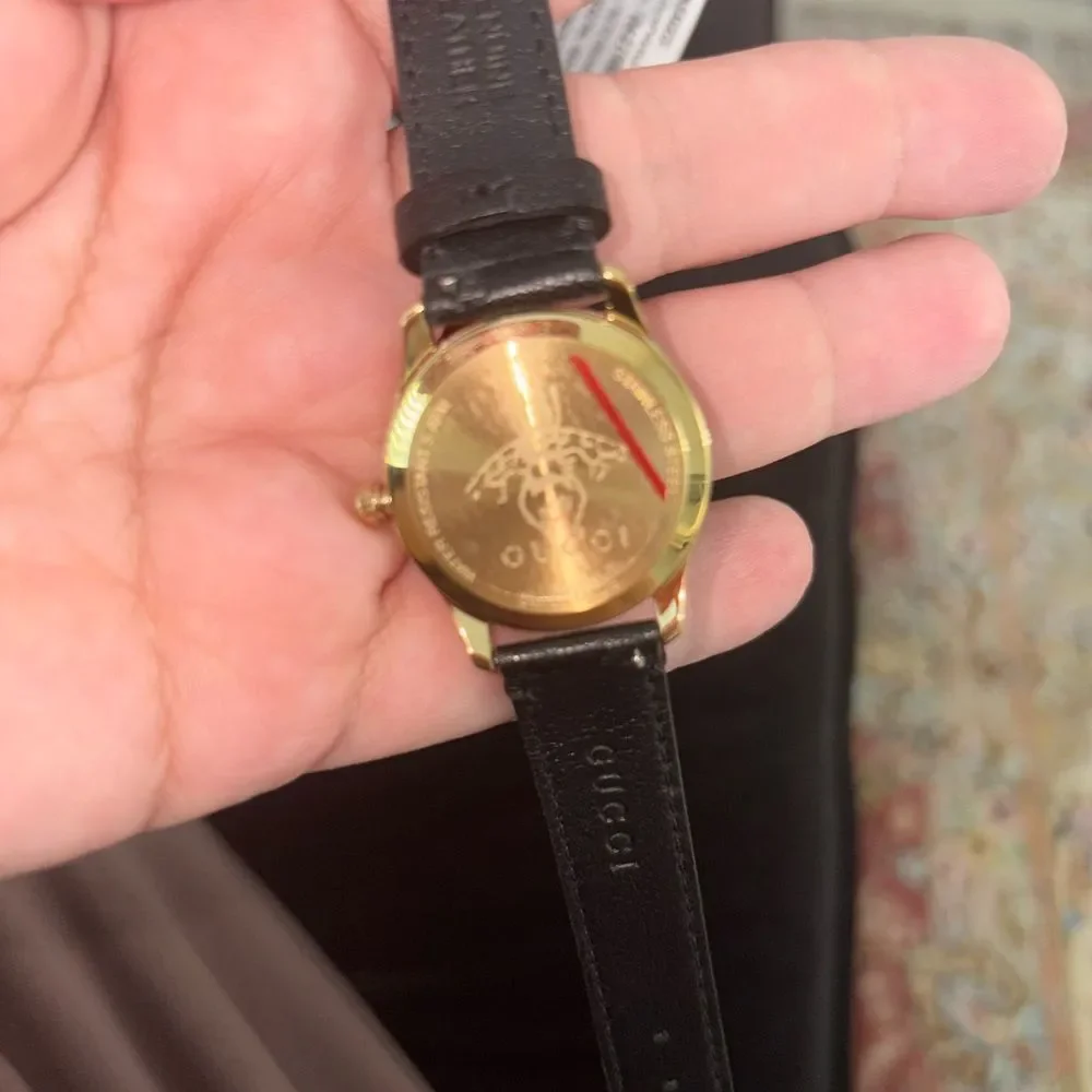 Brand new with box and dustbag Gucci Black and Gold Watch women's