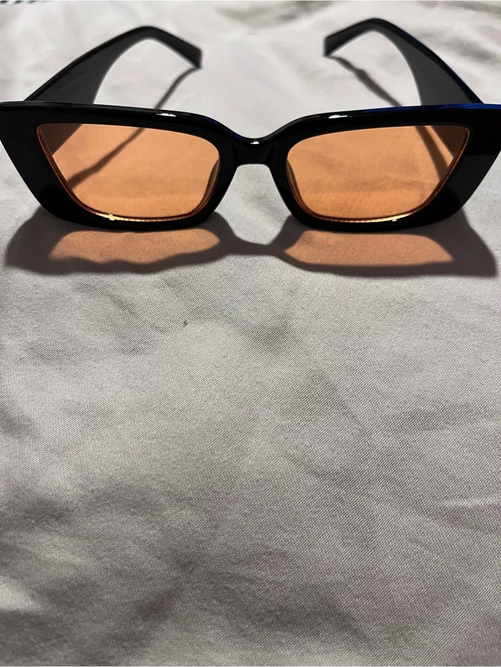 Black Cat-Eye Sunglasses with Amber Lenses