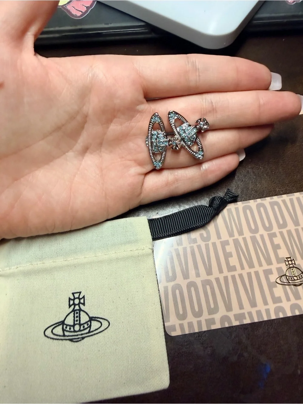 Vivienne Westwood Silver Orb Earrings with Light Blue Crystals