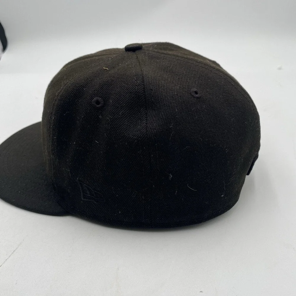 New Era black item fitted
