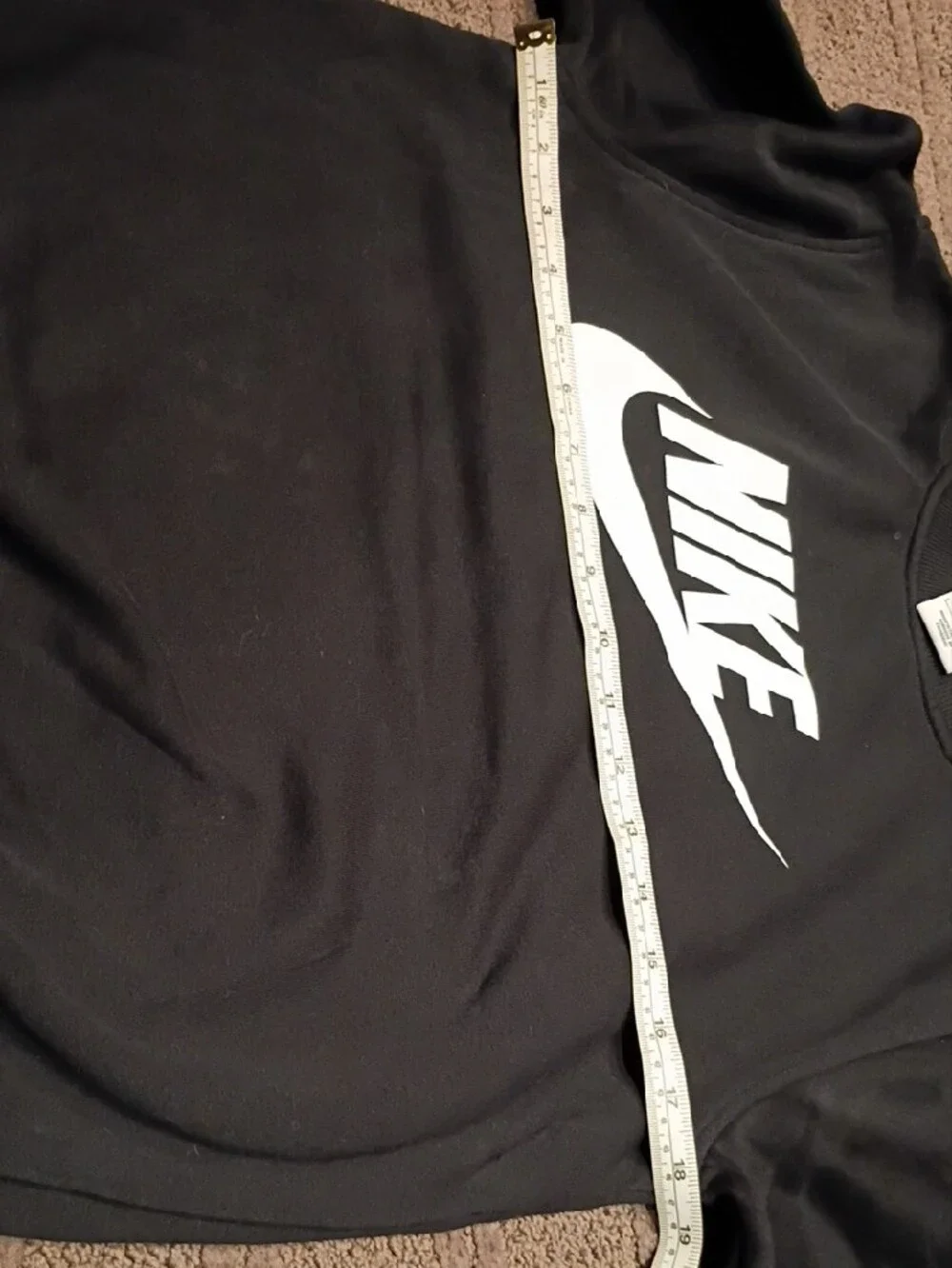 Nike swoosh hem