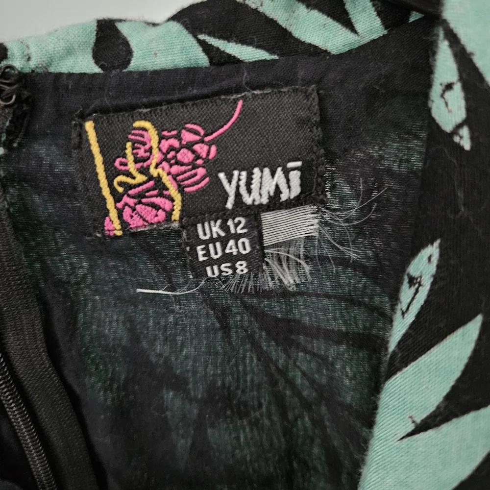 yumi romper striking