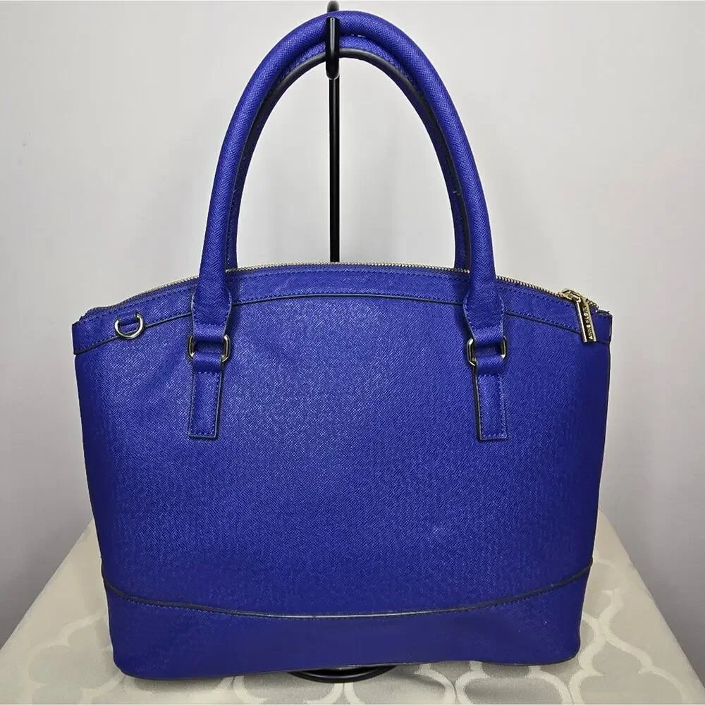 Anne Klein handle like elegant