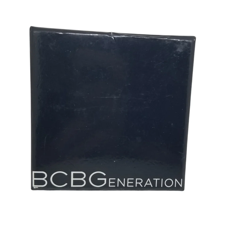 BCBGeneration goldtone key or