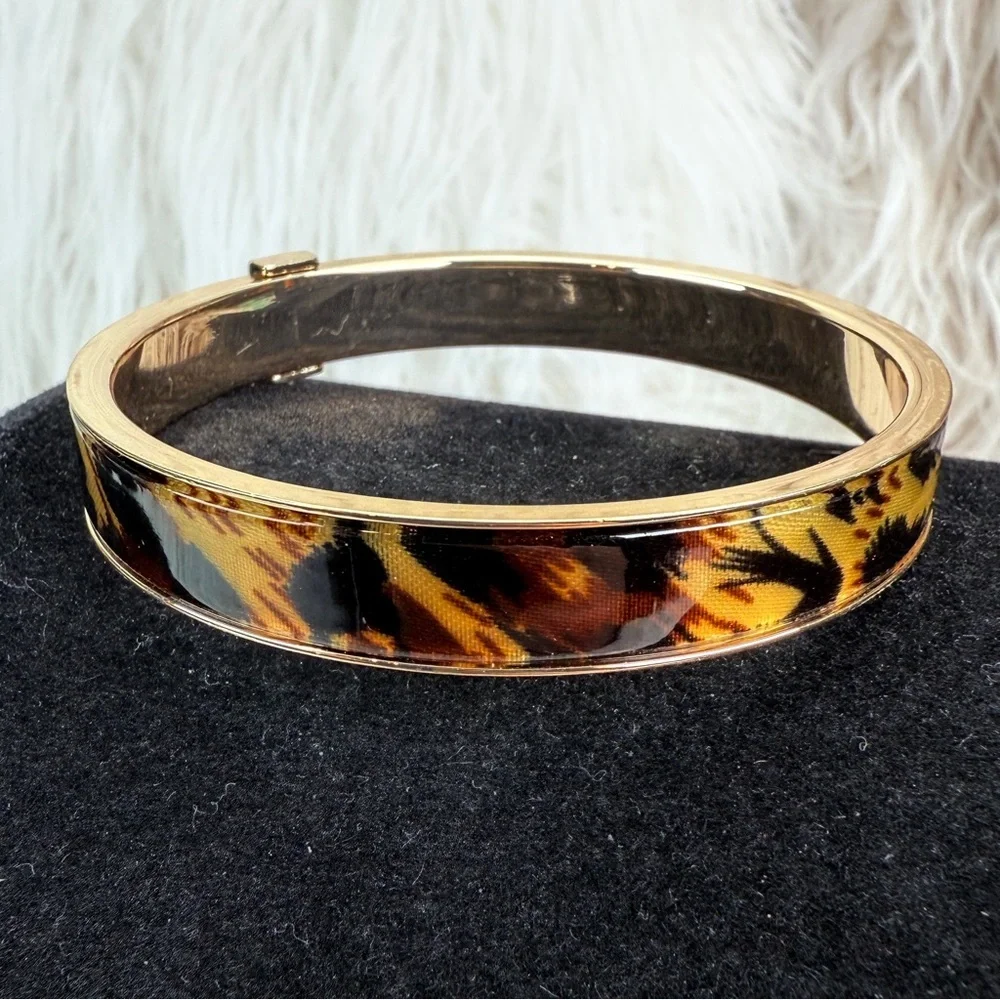 Beautiful, goldtone, animal print nine west bangle bracelet