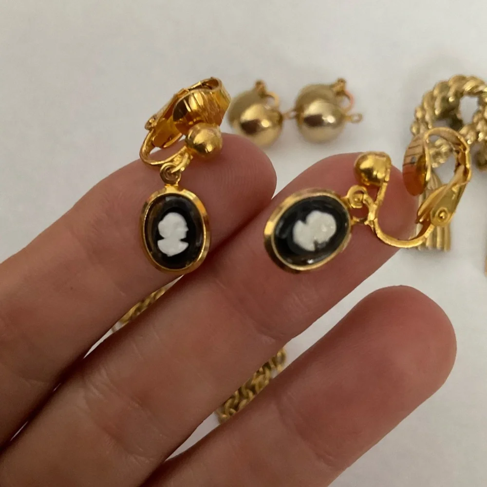 FOUR PAIRS OF‎ VINTAGE GOLD TONE CLIP ON EARRINGS