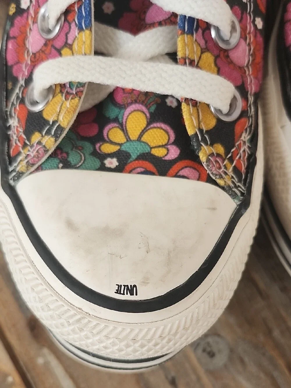 Converse flowers added