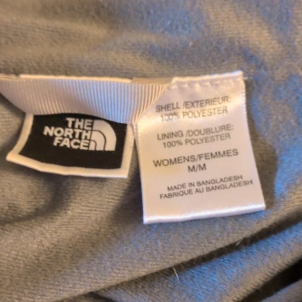 The North Face windbreaker holes jacket