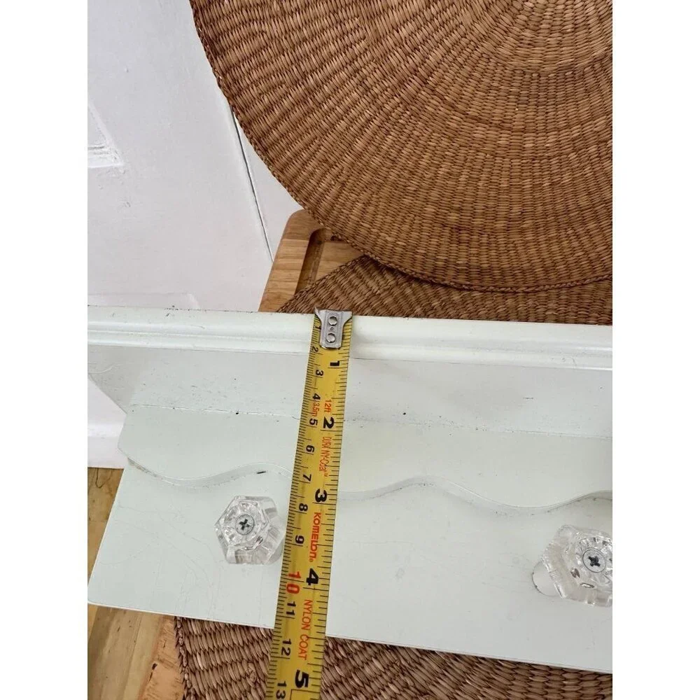 24” long White Shelf with hanging knobs