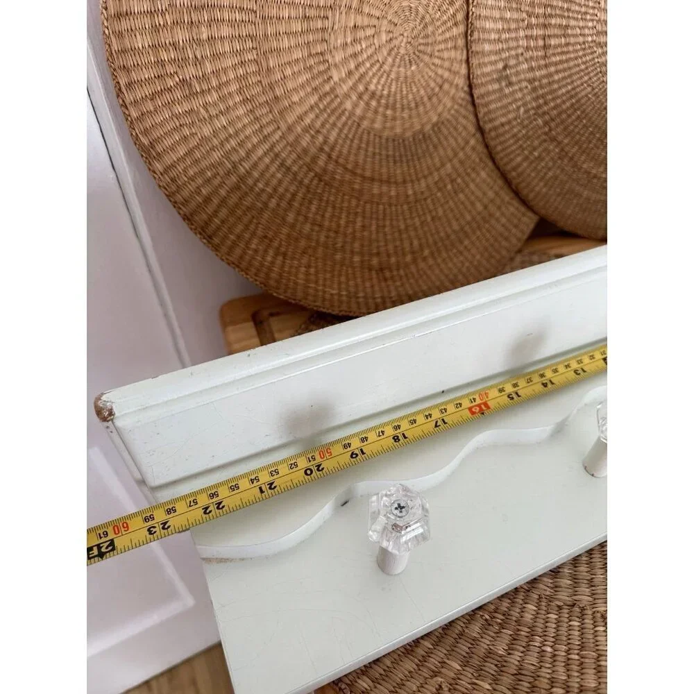 24” long White Shelf with hanging knobs
