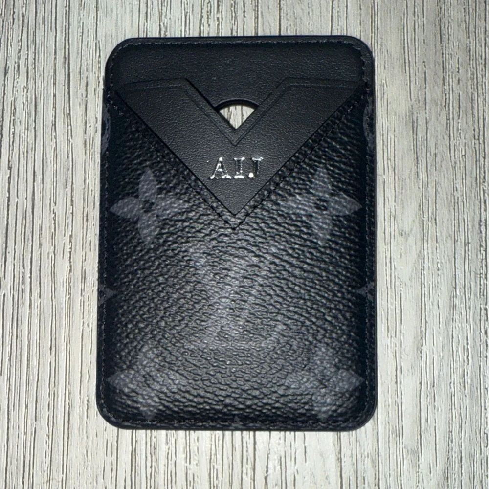 Authentic Louis Vuitton Black Leather Card Holder