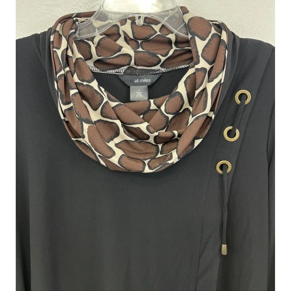 Ali Miles lay giraffe flat