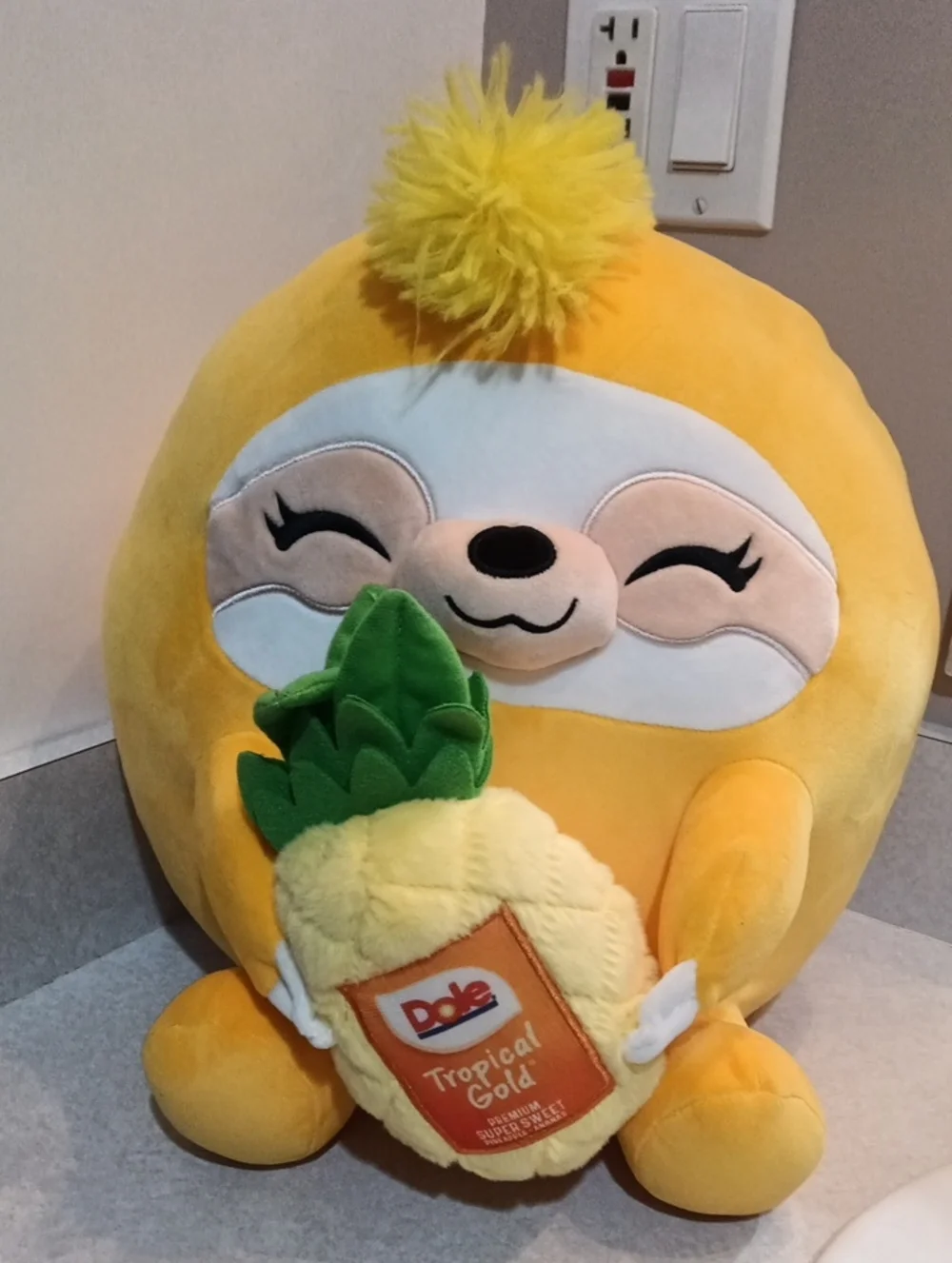 Yellow Sloth Plush Holding Dole Pineapple Toy