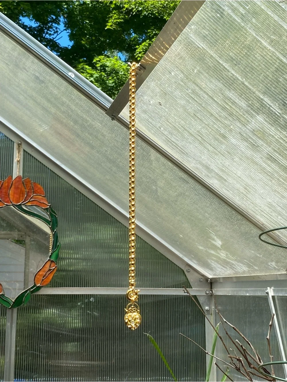 Joan Rivers gold tone