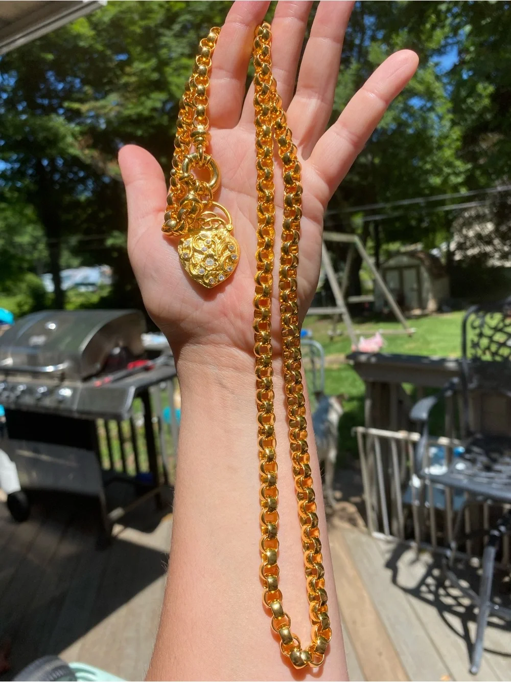 Joan Rivers gold tone