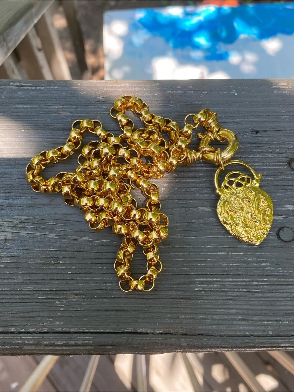 Joan Rivers gold tone
