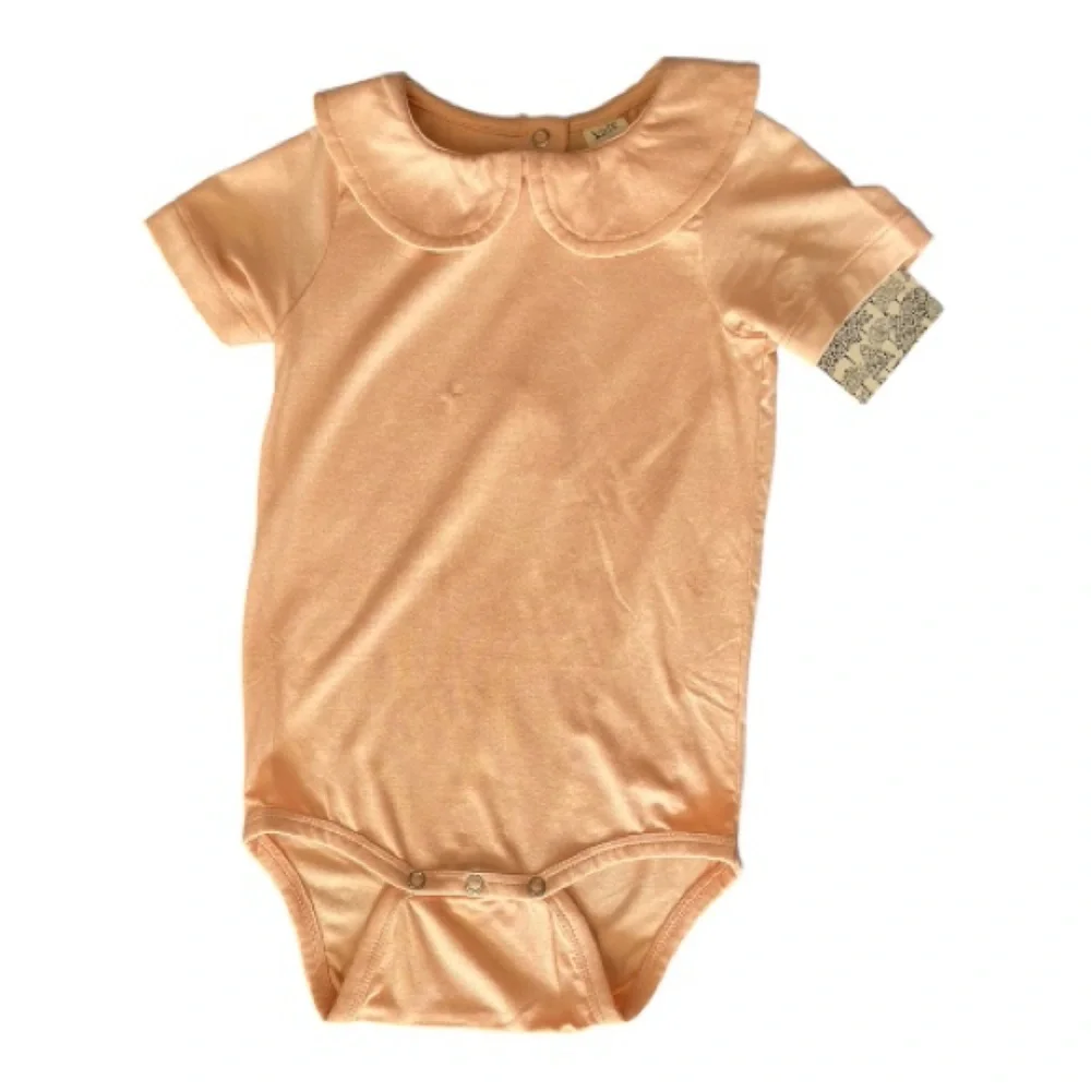#224 kate quinn Apricot Short Sleeve Bodysuit with Peter Pan collar, sz 12-18 mo