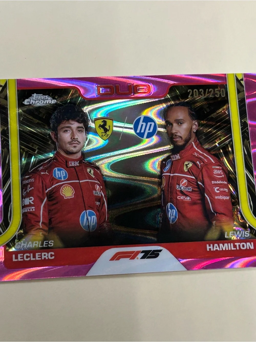 Topps White Racing Card with Red and Yellow Accents