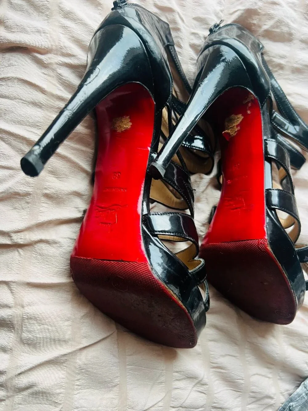 Christian Louboutins Black Patent Cutout Platform Pumps $349