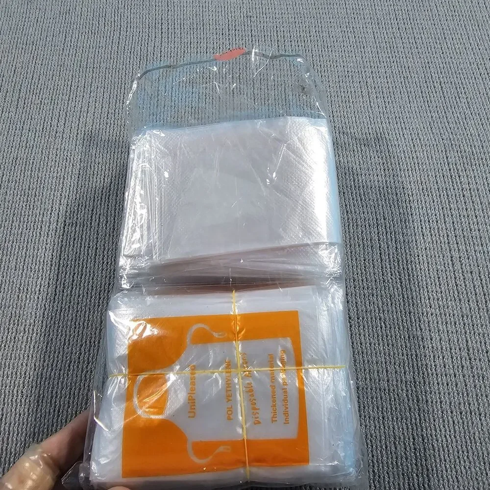 90 Pcs Uniplease plastic apron disposable 34.4x23.6
