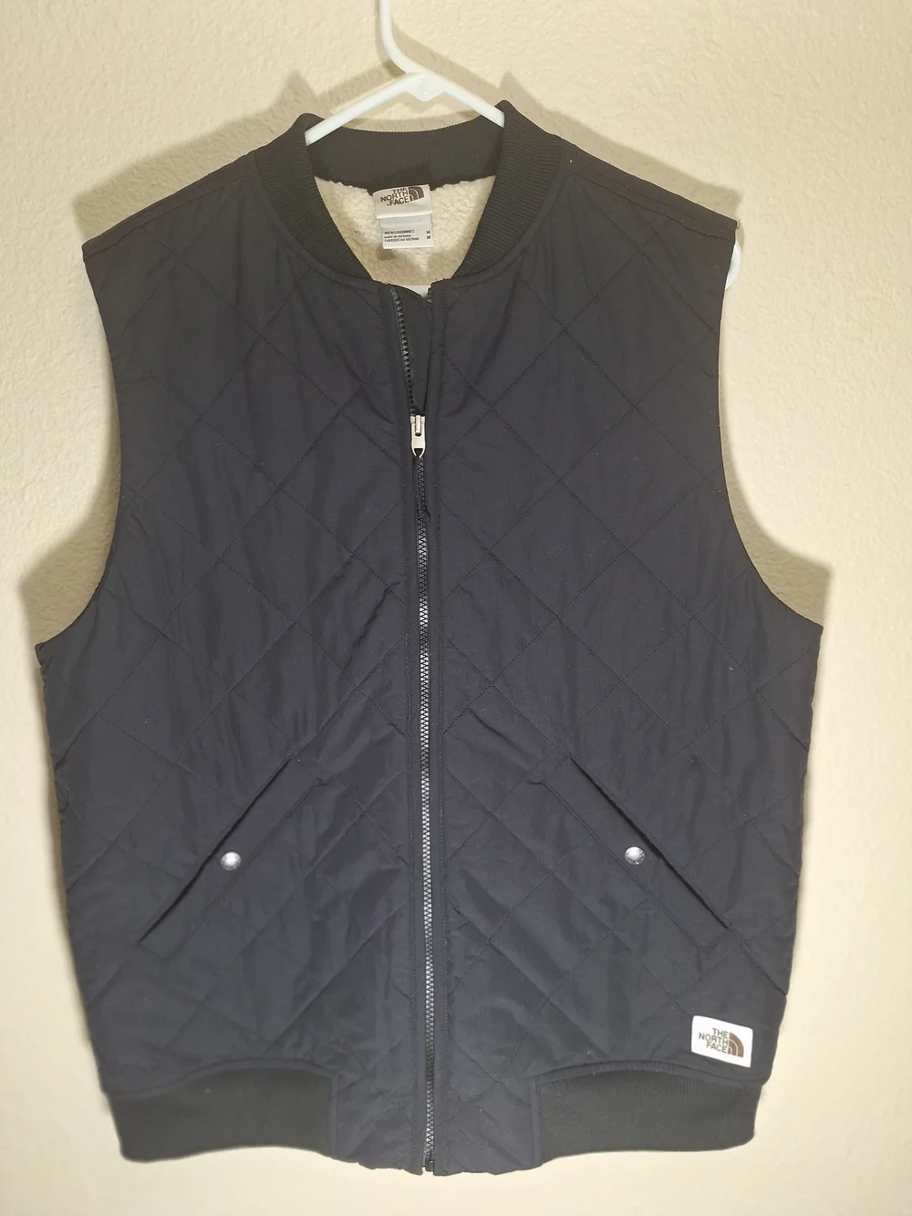 The North Face Black Quilted Vest with Sherpa Lining
