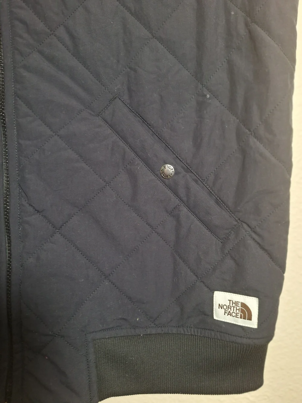 The North Face Black Quilted Vest with Sherpa Lining