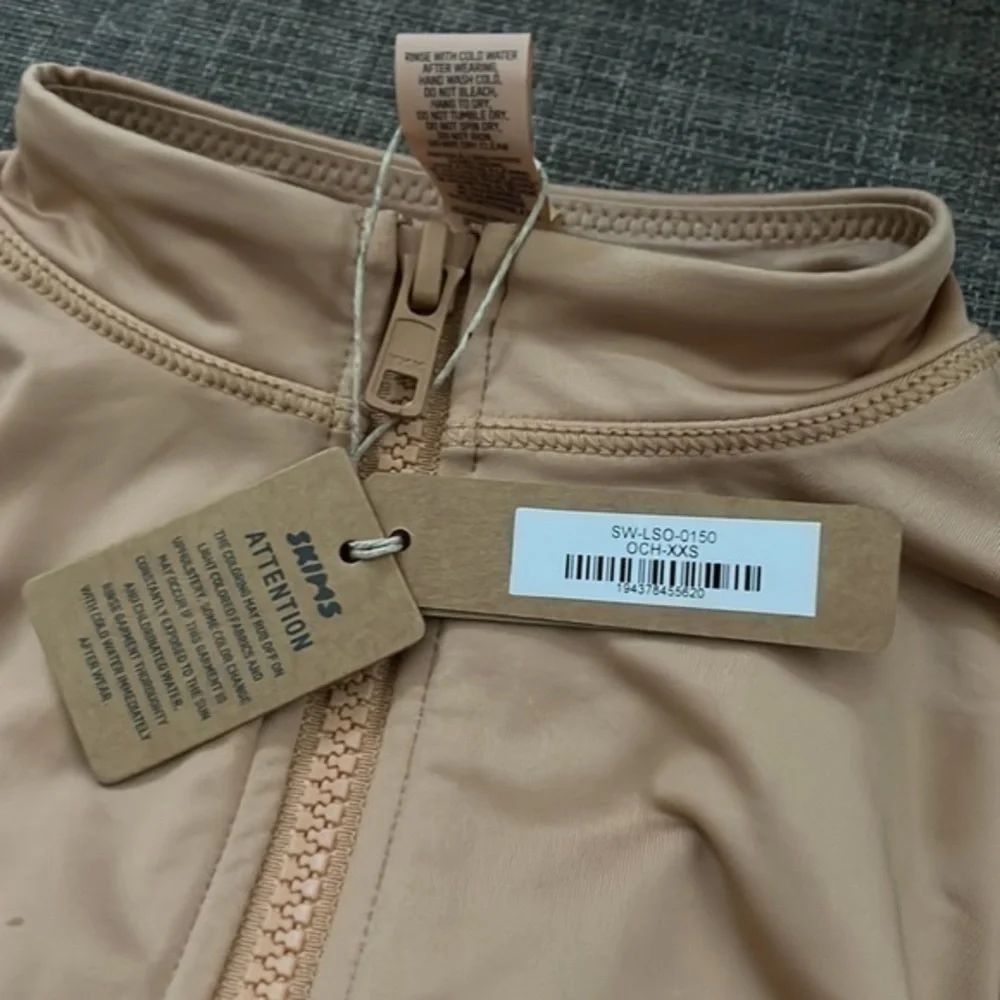SKIMS swim zip